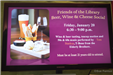 Patrons attending a wine and cheese social at the public library
