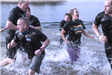 Members of the Newington Police Department in the water at polar plunge event