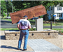 Man standing next to September 11, 2001 Memorial