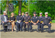 Attendees sitting in chairs at September 11, 2001 memorial dedication