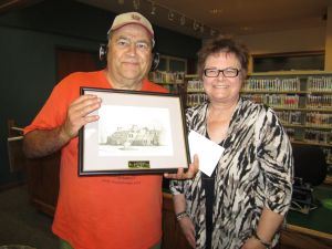 Anthony Palermino with Library  Board Trustee Maureen Lyons being recognized for 21 years of service on the Board