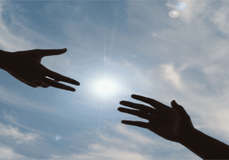 Two hands reaching out