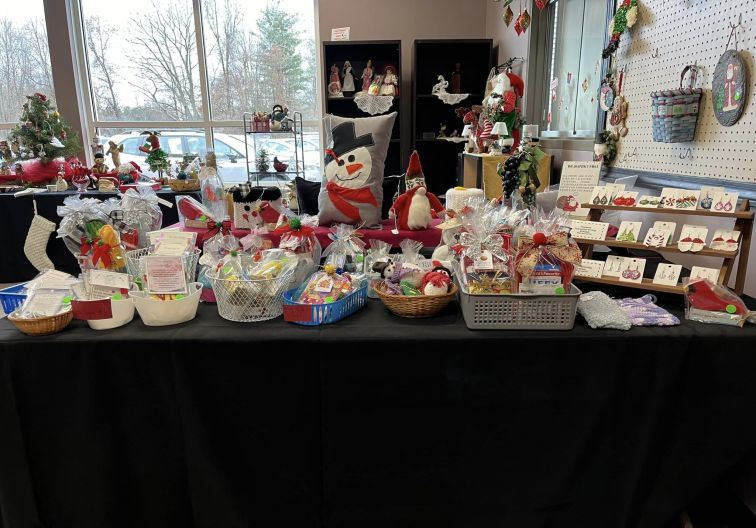 Photo of Senior Center Gift shop display table with various small holiday gifts for sale