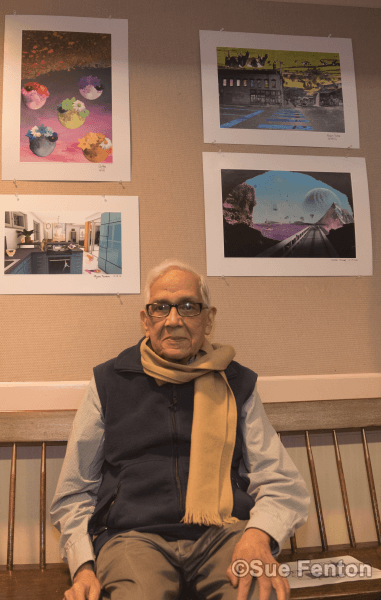 Patrons attending a wine and cheese social at the public library