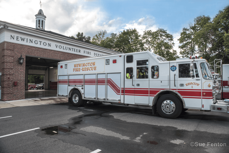 Rescue 1 truck in front of bays at Company 1 