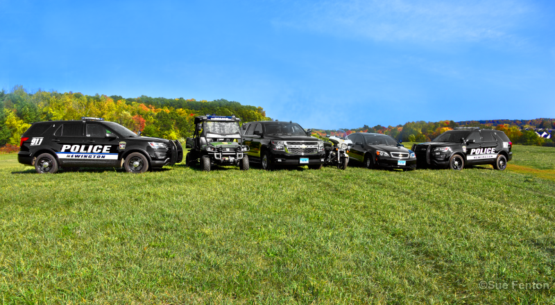 Staged photo of six fleet vehicles used by the Newington Police Department