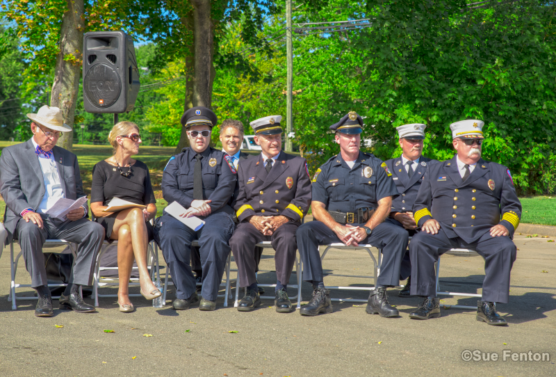 Attendees sitting in chairs at September 11, 2001 memorial dedication
