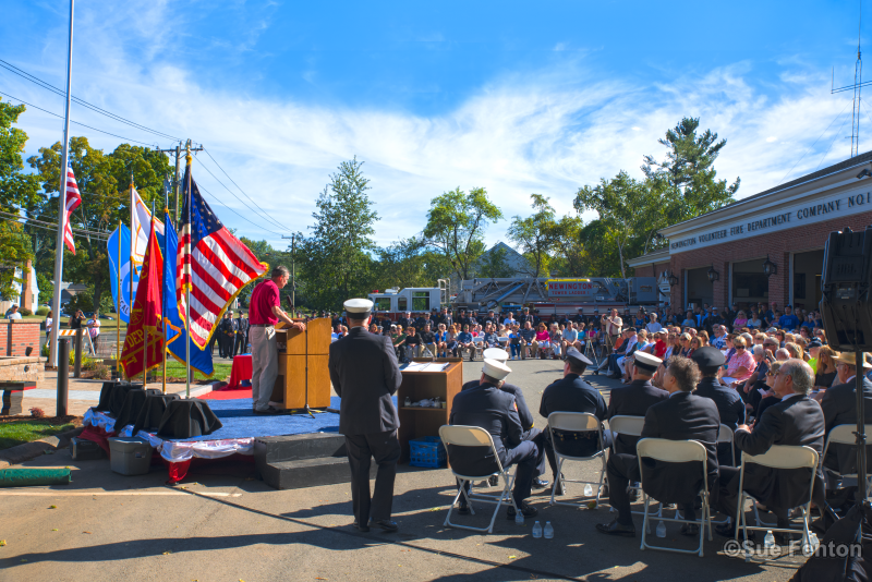 Rear view of someone speaking at lectern
