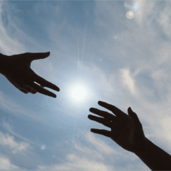 hands reaching out to each other