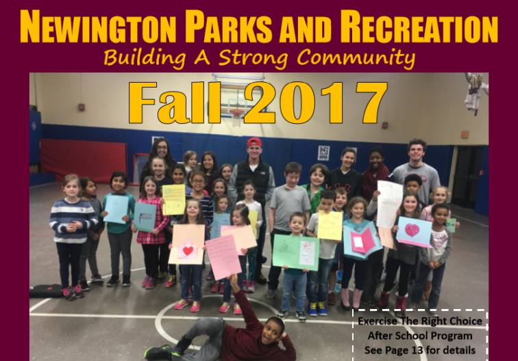 Kids in gymnasium showing off their artwork