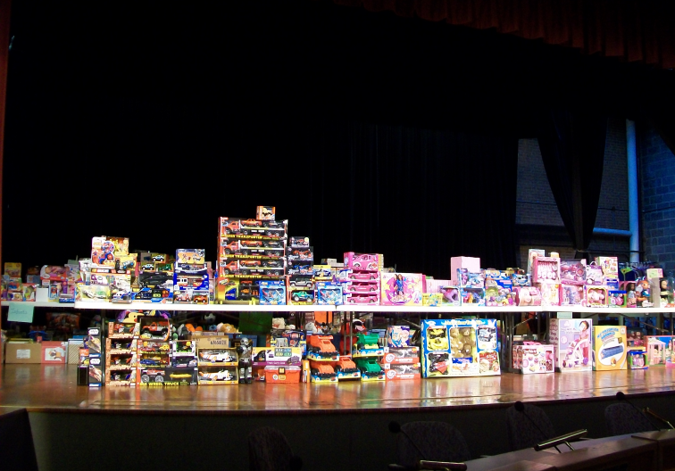 Four tables covered with toys