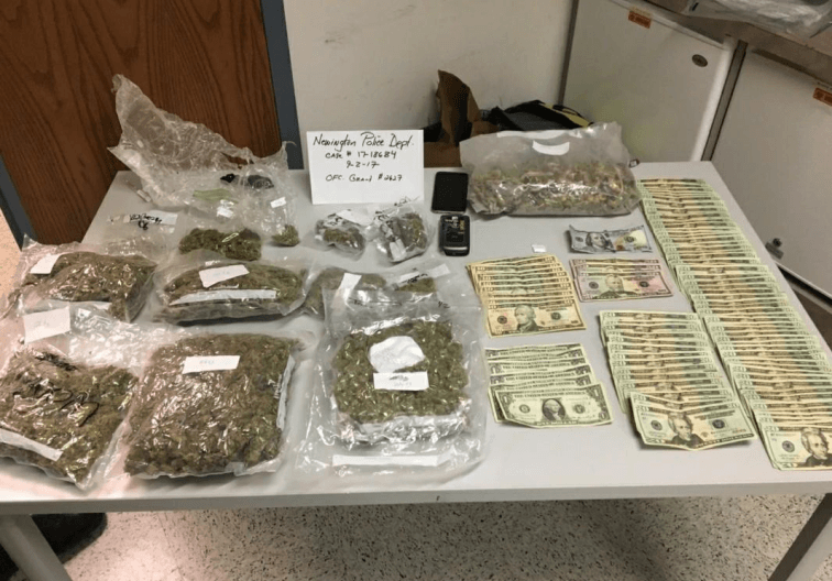 Table with confiscated drugs and money