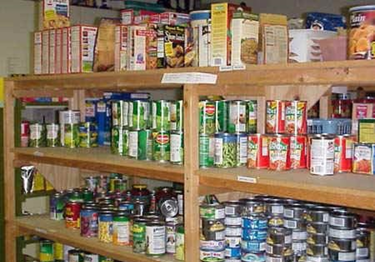 assorted food items on wooden shelf