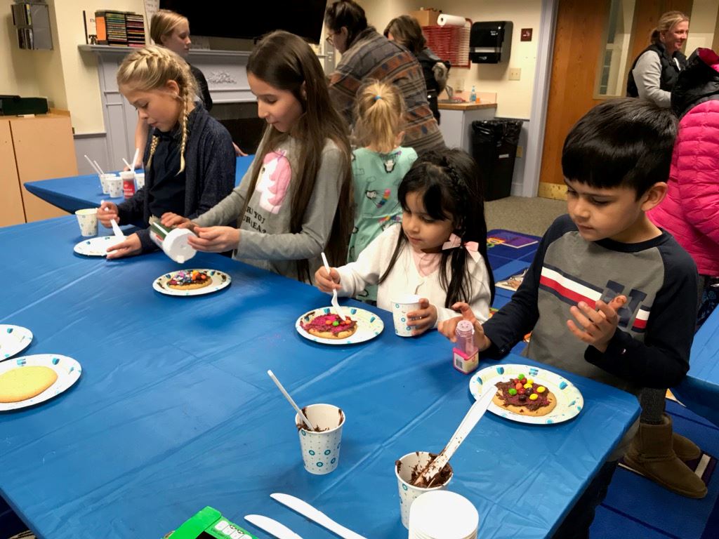 kids frosting and decorating sugar cookies
